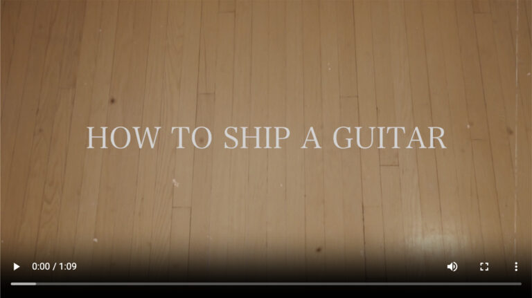 a wooden floor with the words how to ship a guitar